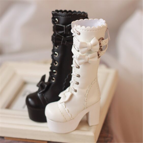 a pair of black and white boots