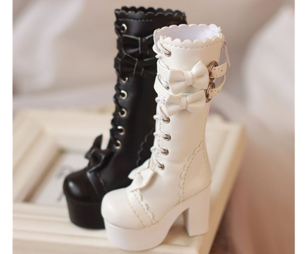 a pair of black and white boots